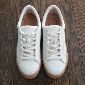 New white canvas sneakers.